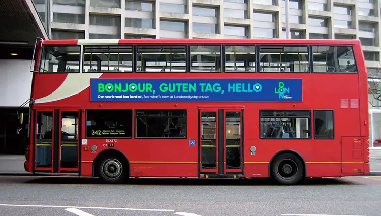 London bus with superside advertising panel