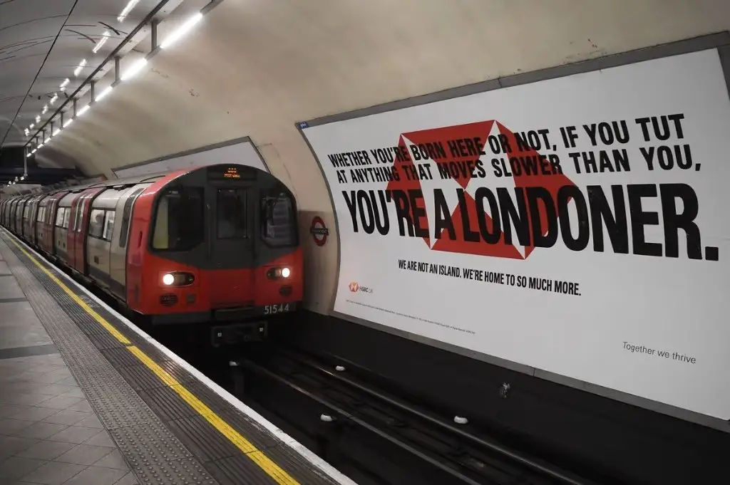 Crosstrack billboard advertising opposite a London Underground platform